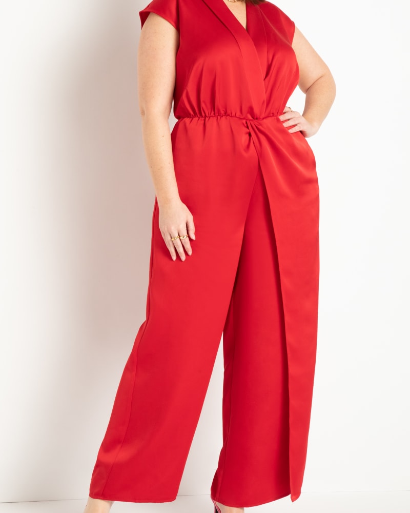 Front of a model wearing a size 18 Draped Front Jumpsuit in Equestrian Red by ELOQUII. | dia_product_style_image_id:300002